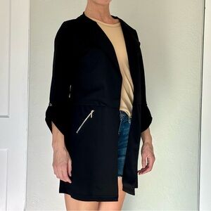 Long black blazer with 3/4 length sleeves and silver metal details